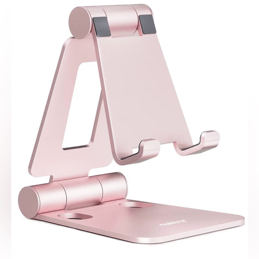 Rose Gold Phone Stand very sturdy
Metal
Never use
Excellent cond - Picture 3 of 4